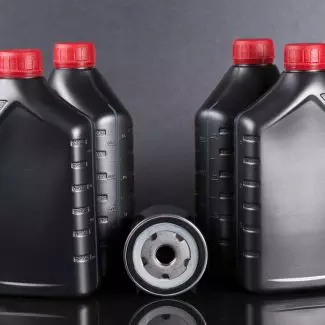 Motor oil bottles and an oil filter